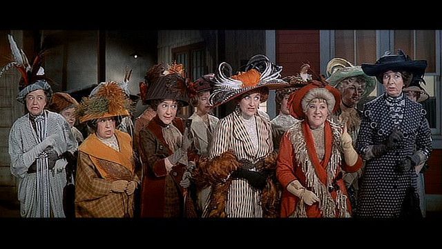 group of women in feathered hats; Pick a Little from The Music Man