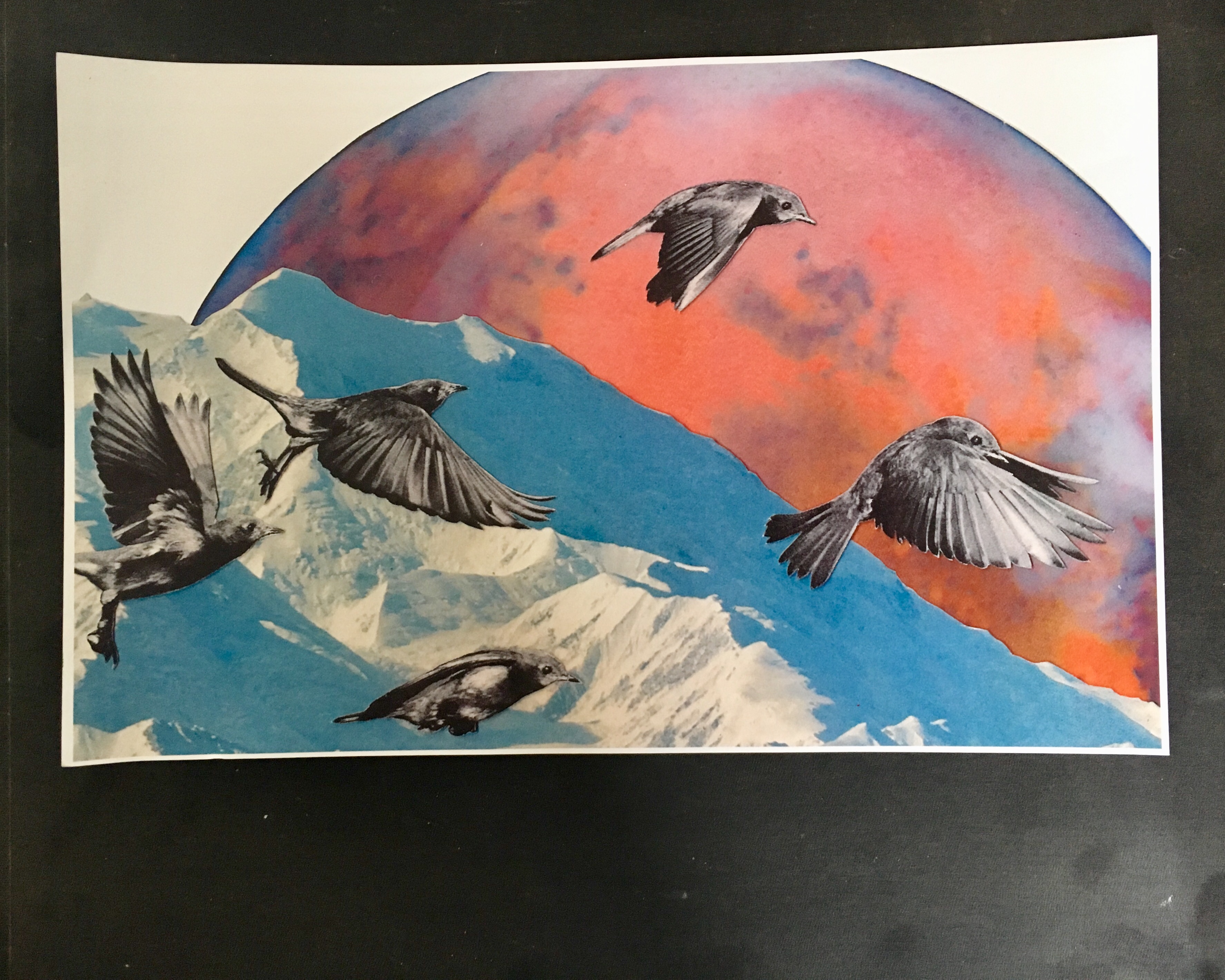 collage of flying birds against a snowy mountain and rising planet on the horizon