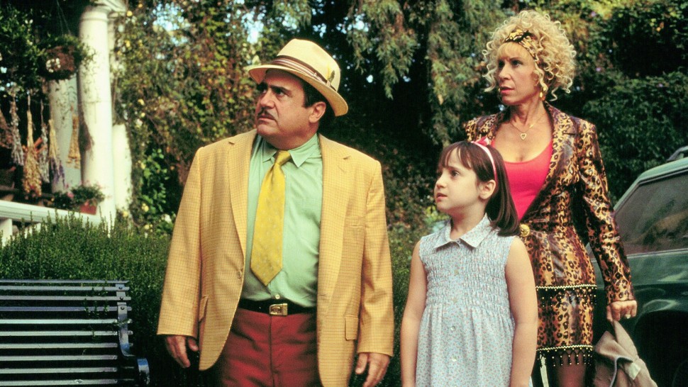 a family looks confused; Danny DeVito and Rhea Perlman in Matilda