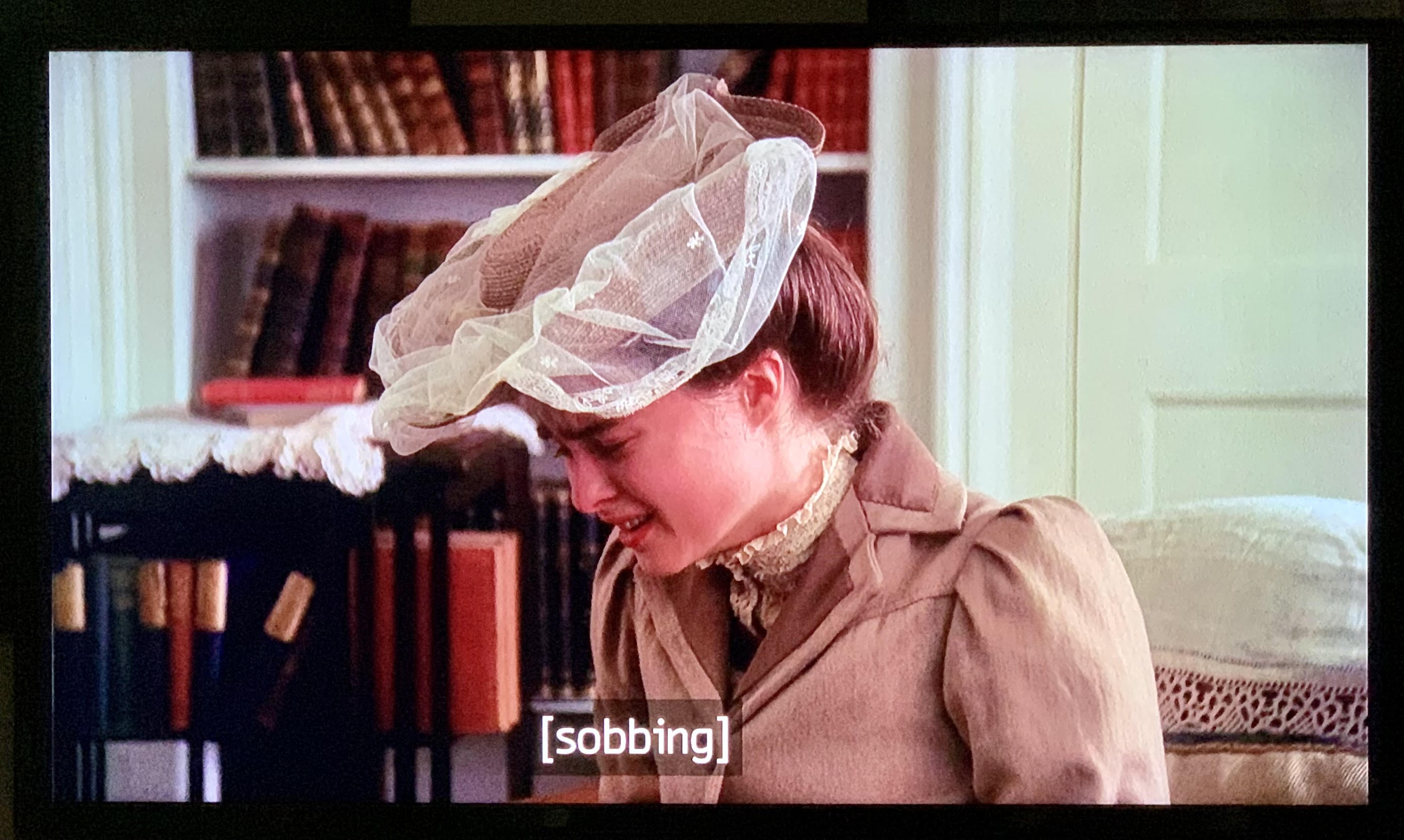 girl in veiled hat cries; Helena Bonham-Carter in A Room With A View