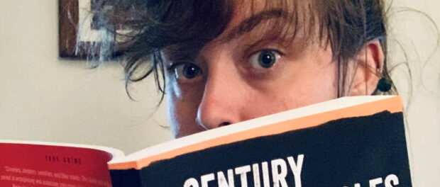 A brown-haired woman - Railey Jane Savage - peeks over the cover of A Century of Swindles: Ponzi Schemes, Con Men, and Fraudsters