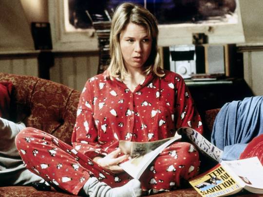 a blond woman stares open-mouthed while wearing silly red penguin pajamas; Renee Zellweger in Bridget Jones's Diary