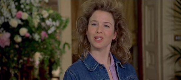a white woman with messy hair mugs to the camera; Renee Zellweger in Bridget Jones's Diary